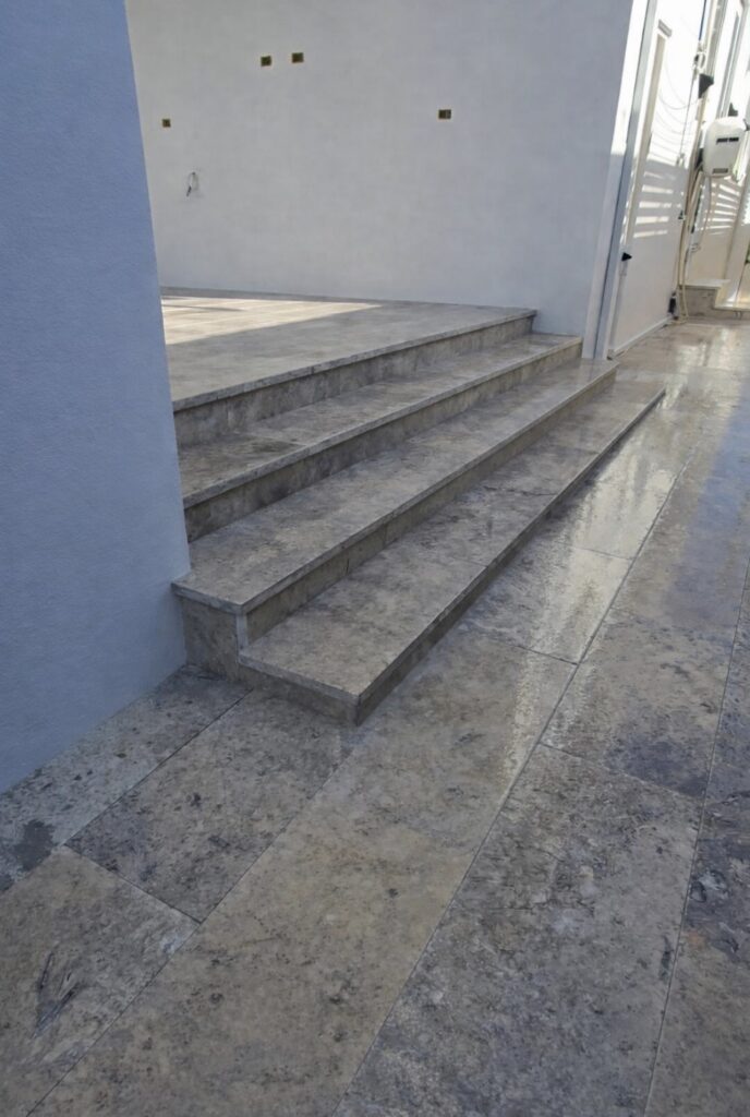 Travertine steps and paving installation to property in Cottesloe. 