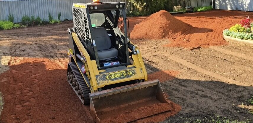 Earthworks for a backyard in Mt Helena removing existing lawn and garden and installing a gravel driveway and gravel car park to back of property. 
