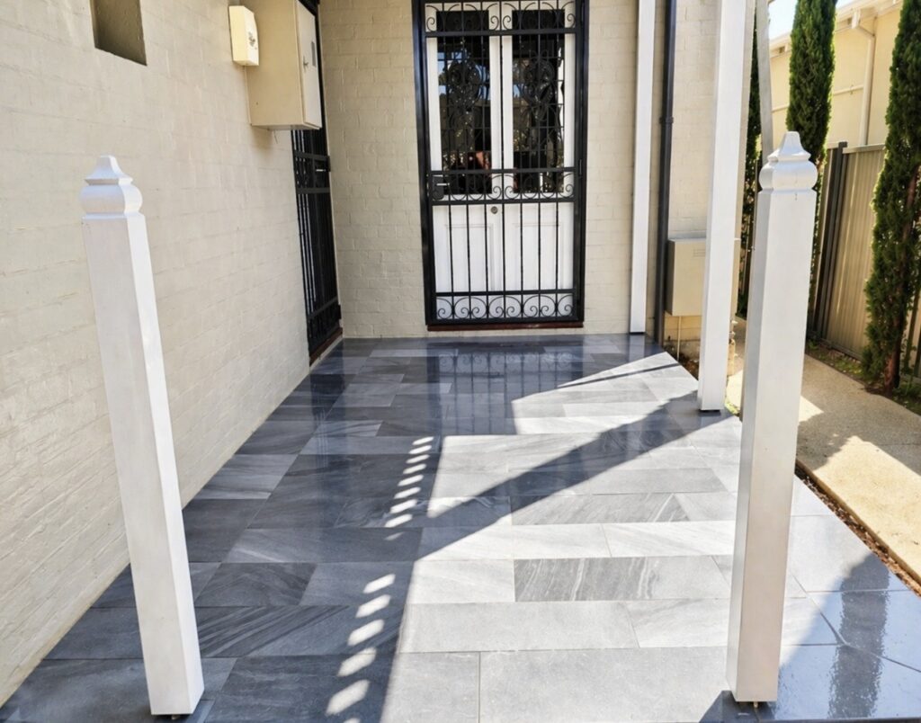Modern entry pathway with new bluestone paving to residential property in Cottesloe. 